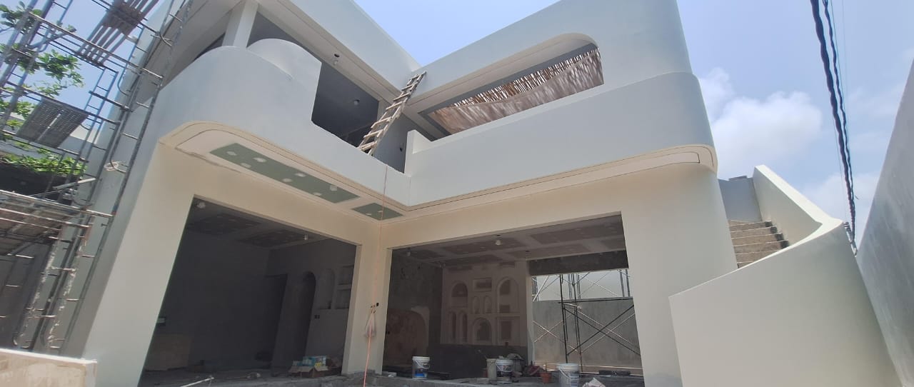Villa with the exterior rendered and painted, and interior ceilings and walls in progress